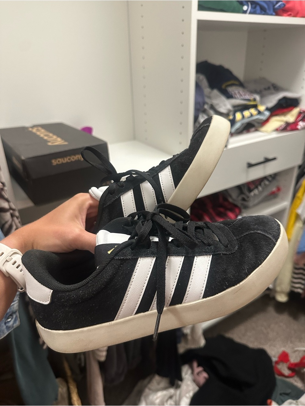 Women’s black adidas sneakers